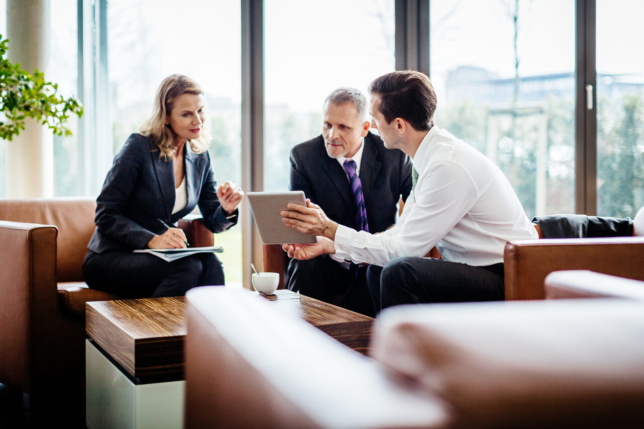 Business succession planning meeting with advisers